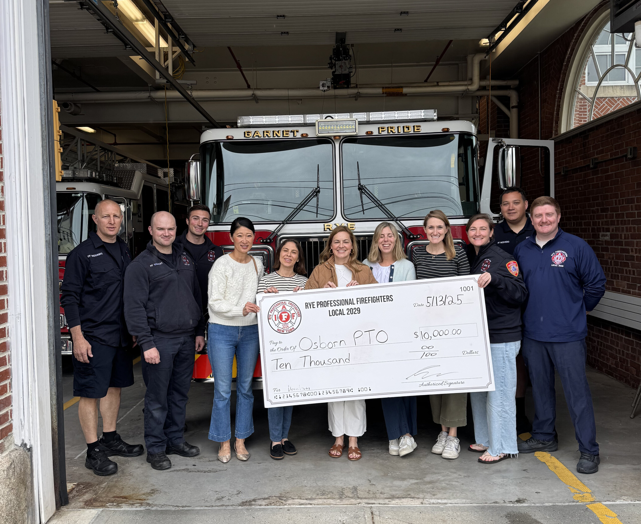 (PHOTO: On Tuesday, May 13, 2025, Local 2029 presented the Osborn PTO with a $10,000 grant for families who receive financial assistance and scholarships. Left to right: Sal Inguanti (president); FF Tyler Conway; FF Daniel Archino; Valerie Chuebon (treasurer); Osborn PTO reps Stacy Bittel, Jen Cain, Sharon Mantel and Carolyn Jessup; FF Cea Fong (board member); Cristian Acevedo (board member); FF Andrew Wood (board member). Contributed.)