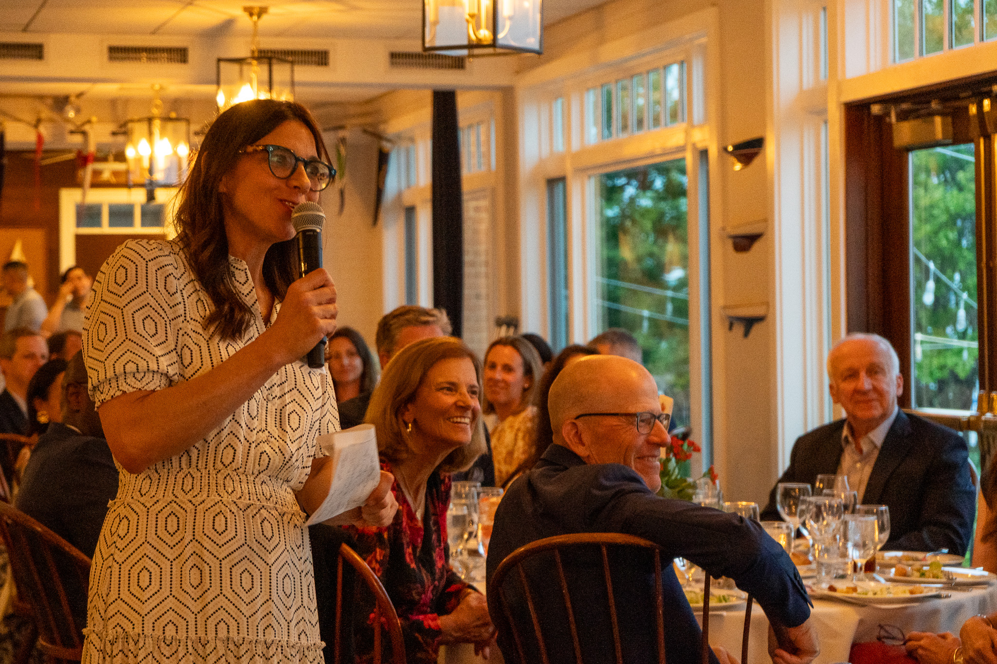 (PHOTO: The Friends of Rye Nature Center (FRNC) raised over $160,000 at its annual Nature Access Fund (NAF) Benefit fundraiser on Friday, May 30, 2025. FRNC Executive Director Christine Siller addresses the crowd. Contributed.)