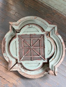 (PHOTO: One of the original eight quatrefoil “rosette” windows from the Rye Town Park tower building. It was found in the basement of the building and will service as a model to restore all eight windows. Contributed.)
