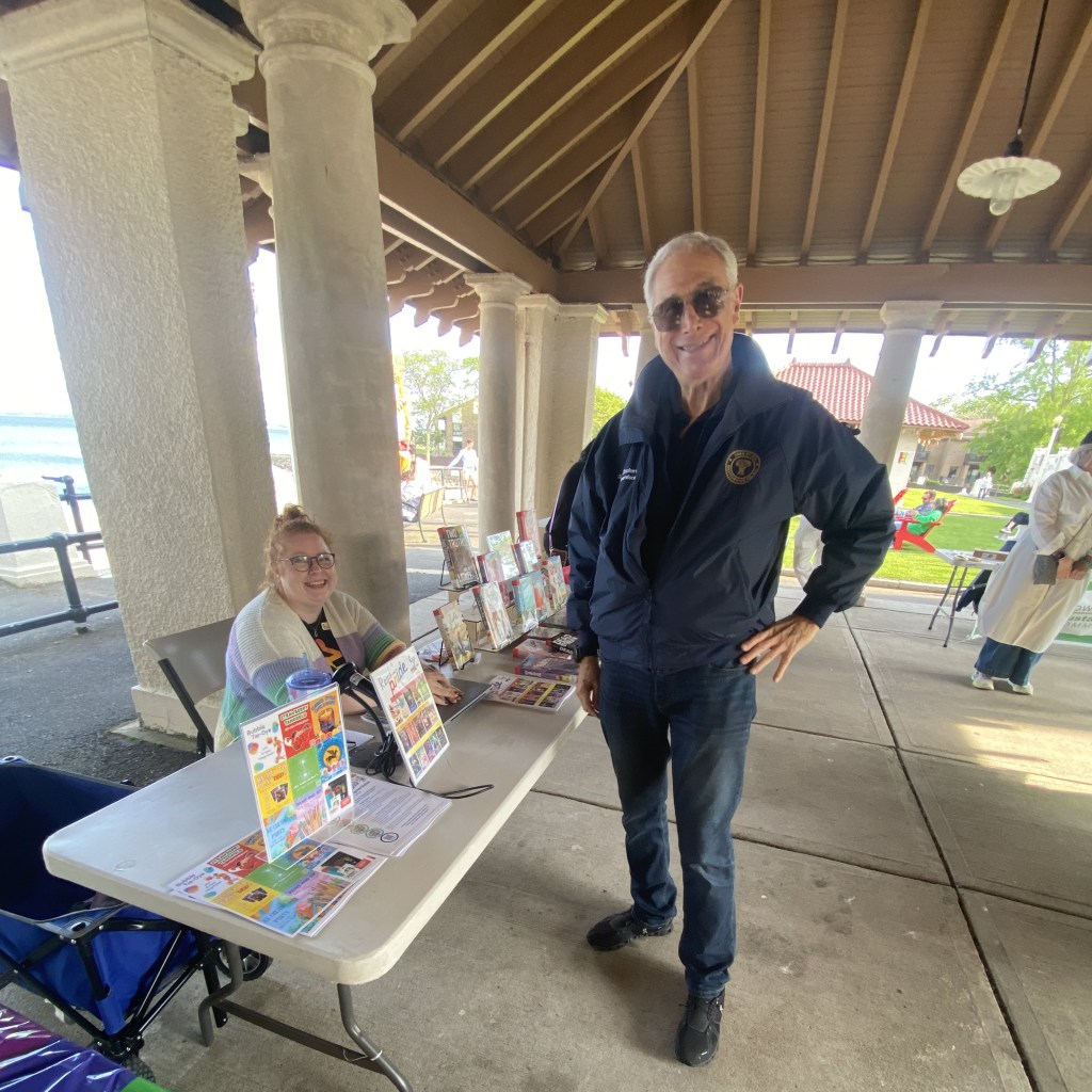 (PHOTO: The Fifth Annual Pride Month Celebration was held in Rye Town Park on May 31, 2025, organized by the Town of Rye, Rye Town Park, and pRYEde. pRYEde 's Amanda Timchak and Rye Town Supervisor Gary Zuckerman checking out the art fair.)