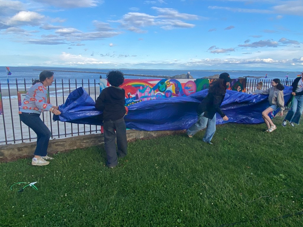 (PHOTO: The Fifth Annual Pride Month Celebration was held in Rye Town Park on May 31, 2025, organized by the Town of Rye, Rye Town Park, and pRYEde. The new pride mural - unveiled.)