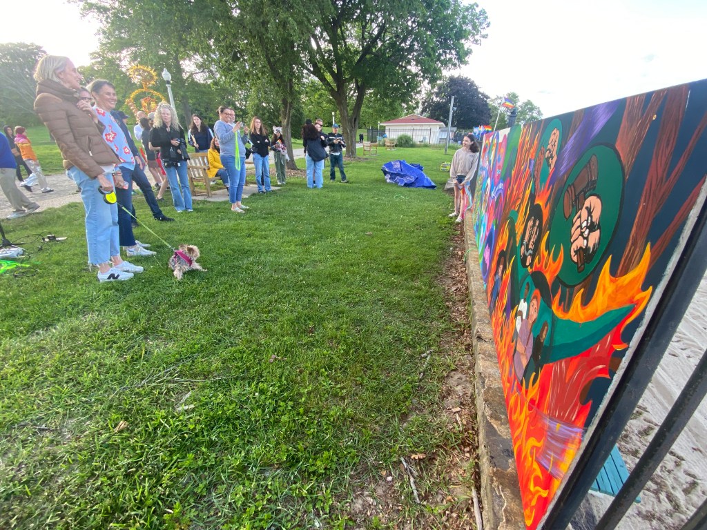 (PHOTO: The Fifth Annual Pride Month Celebration was held in Rye Town Park on May 31, 2025, organized by the Town of Rye, Rye Town Park, and pRYEde. Event goers admire the new pride mural.)