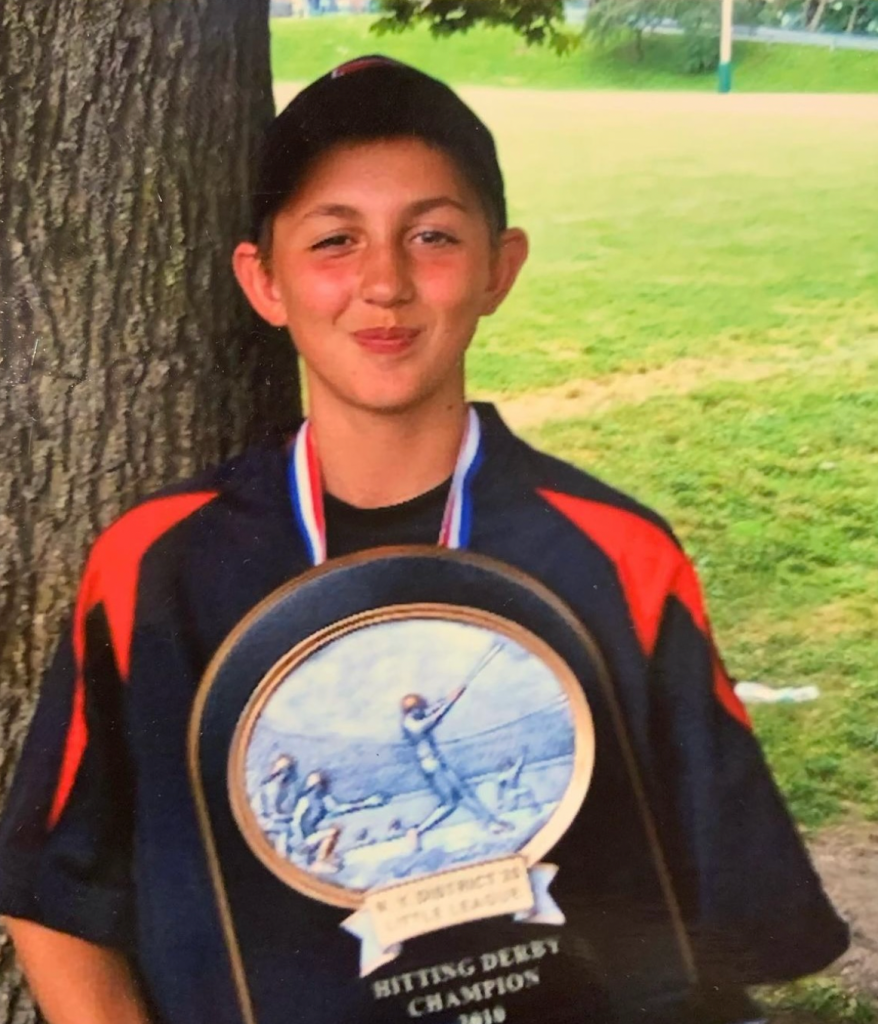 (PHOTO: George Kirby in 2010 holding up his trophy from the Hitting Derby during his time playing for the Rye Little League.)