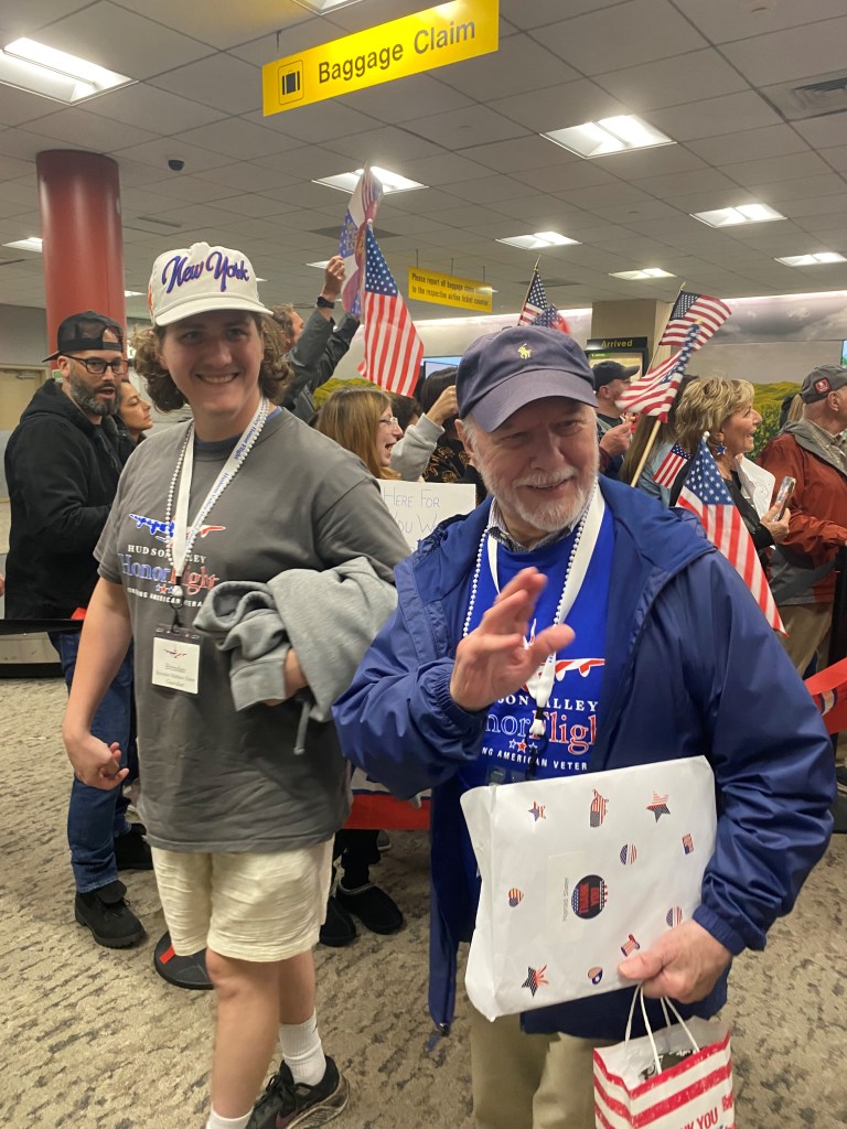 (PHOTO: Seven Rye veterans participated in an honor flight to Washington, D. C. on Saturday, May 31, 2025. Jim Dianni about to board the Honor Flight. Brendan Hickey and Sonny Slater at the Welcome Home Reception. Contributed.)
