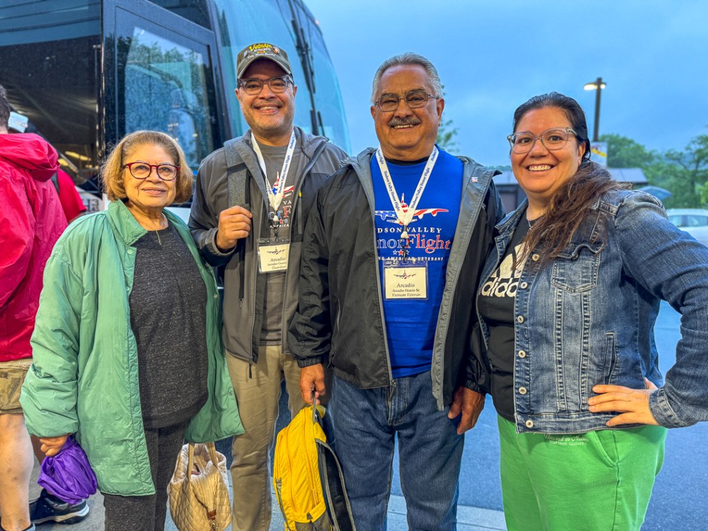 (PHOTO: Seven Rye veterans participated in an honor flight to Washington, D. C. on Saturday, May 31, 2025. Arcadio Ocasio with his family before the Honor Flight Mission. Contributed.)