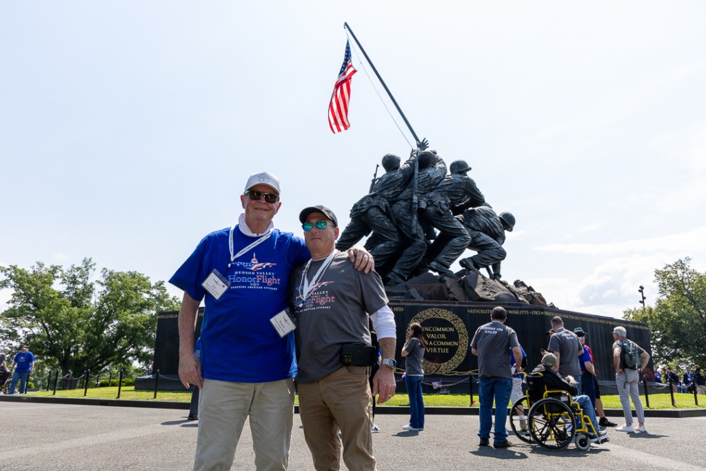 (PHOTO: Seven Rye veterans participated in an honor flight to Washington, D. C. on Saturday, May 31, 2025. Jim Dianni and his guardian at the US Marine Corps War Memorial. Contributed.)