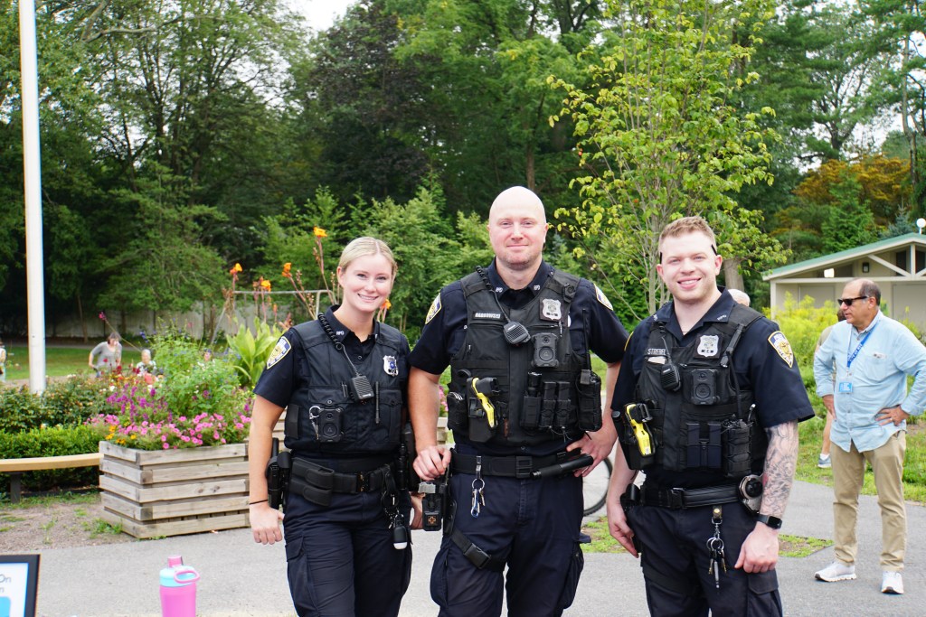 (PHOTO: Rye PD held its third annual National Night Out on August 5, 2025 at Rye Recreation. PO Lauren Duffy, PO Daniel J Dabrowski and PO Gary Strebel. Credit: Eli Chopra.)