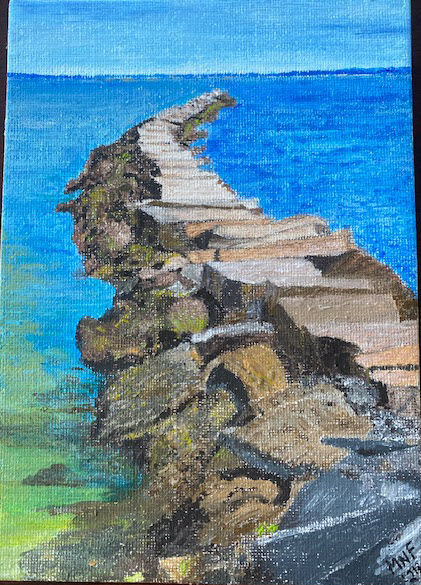 (PHOTO: Playland Rock Jetty. Rocky pier stretching out into the Long Island Sound. By Maureen Fearon.)