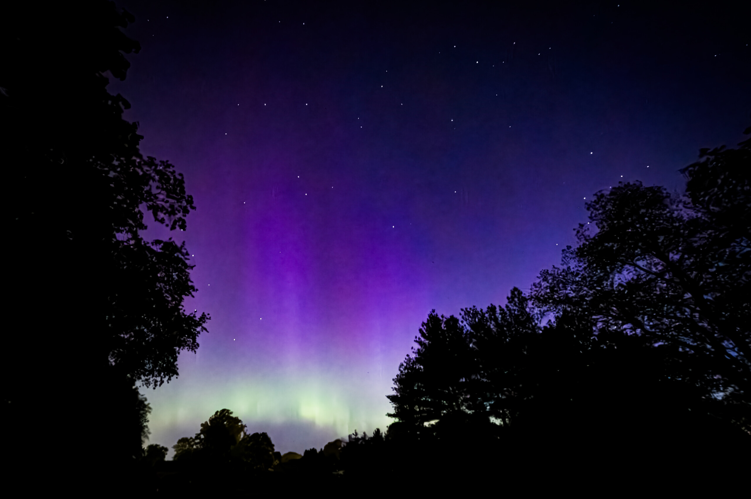 PHOTO: Aurora Borealis. A rare, yet powerful solar flare seen by a lucky few in May 2024. By Stacey Massey, author of Fall in Love with Rye.