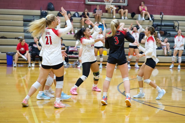 (PHOTO: The Rye Volleyball team celebrates a point against Ossining on September 26, 2025. Credit: Tatia Tatia Chkheidze.)