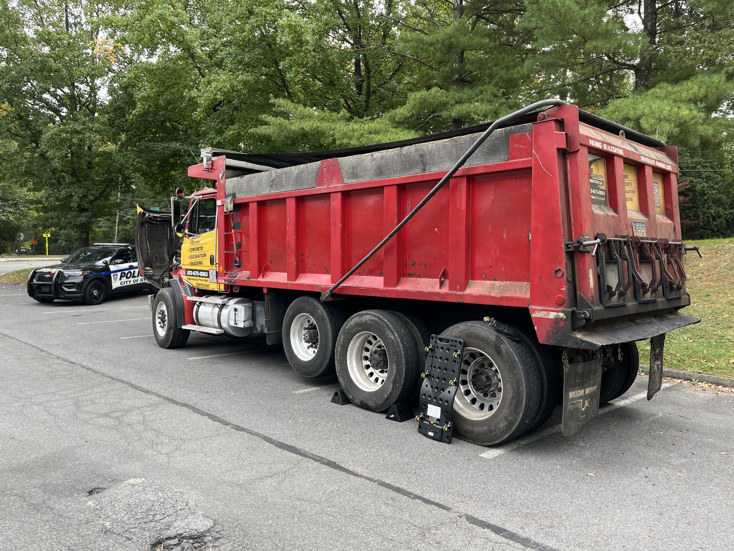 (PHOTO: On Wednesday, September 24, 2025, the Rye PD issued 17 violations for a construction truck operating on Rye roadways that was 30%+ overweight and operating with defective brakes. Truck owner AF Quality Construction LLC of Bridgeport, Connecticut was cited for 17 separate violations on the NYS DOT inspection report. Source: Rye PD.)