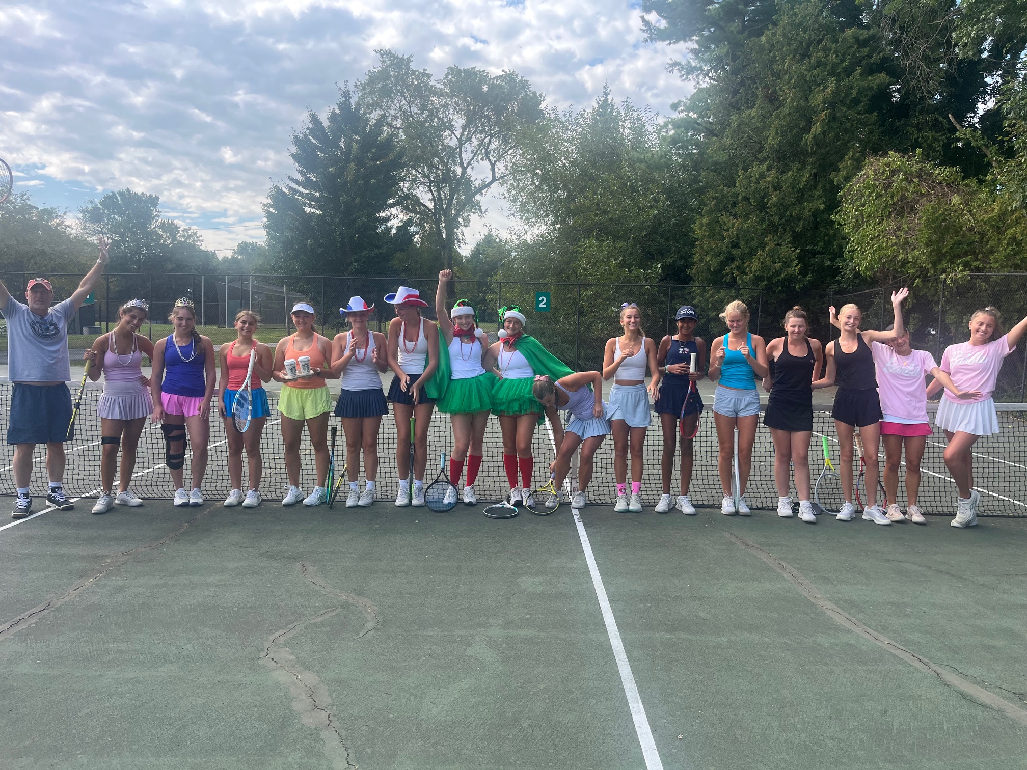 (PHOTO: The Rye Girls Varsity Tennis team posing in their partnered costumes before our annual Starbucks Cup Tiebreaker Tournament. Contributed.)