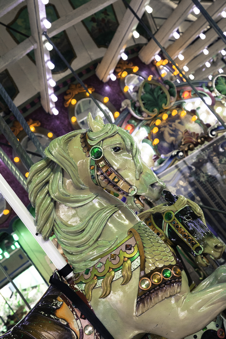 [PHOTO: Technicolor Playland Ride. The merry-go-round is beloved by all who visit Playland. By JoAnn Cancro.]