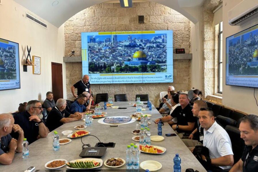 (PHOTO: Public Safety Commissioner Michael Kopy (left side, leaning on table) was part of a delegation of 13 law enforcement heads across the tri-state area invited to a conference on counterterrorism by the State of Israel and the local Community Security Initiative (CSI). Credit: Community Security Initiative (CSI).)