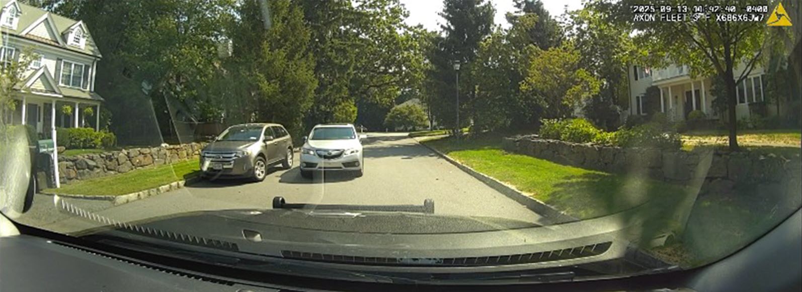 (PHOTO: Rye PD dashcam photo shows the stolen Acura RDX that passed a Rye Police Department patrol car on Saturday, September 13, 2025. Source: Rye PD.)