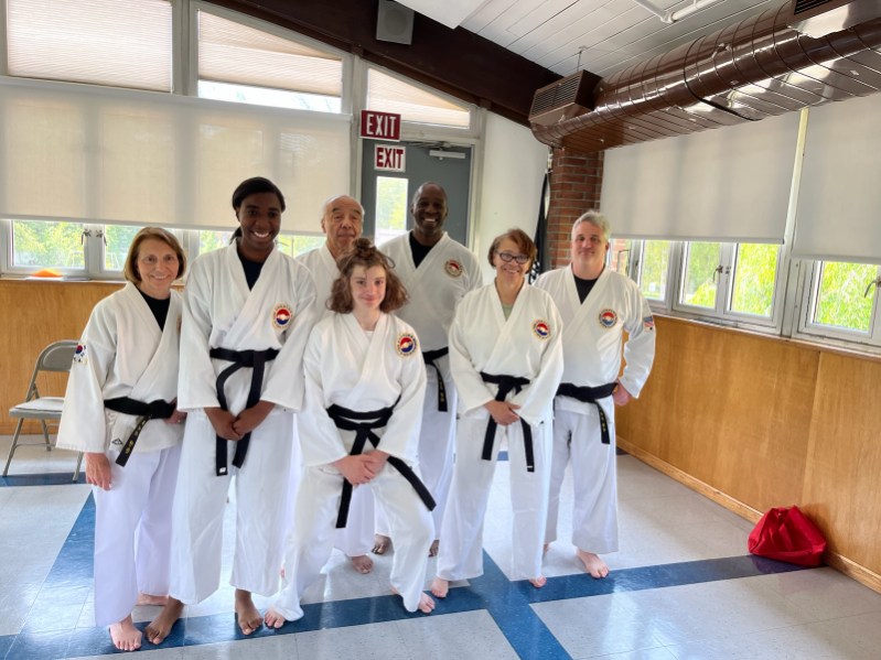 (PHOTO: Westchester Tae Kwon Do Association with Master Rico Dos Anjos (8th Dan) & Master Russell Fulmore (7thDan) with other Black Belt level students at Rye Recreation Center.)