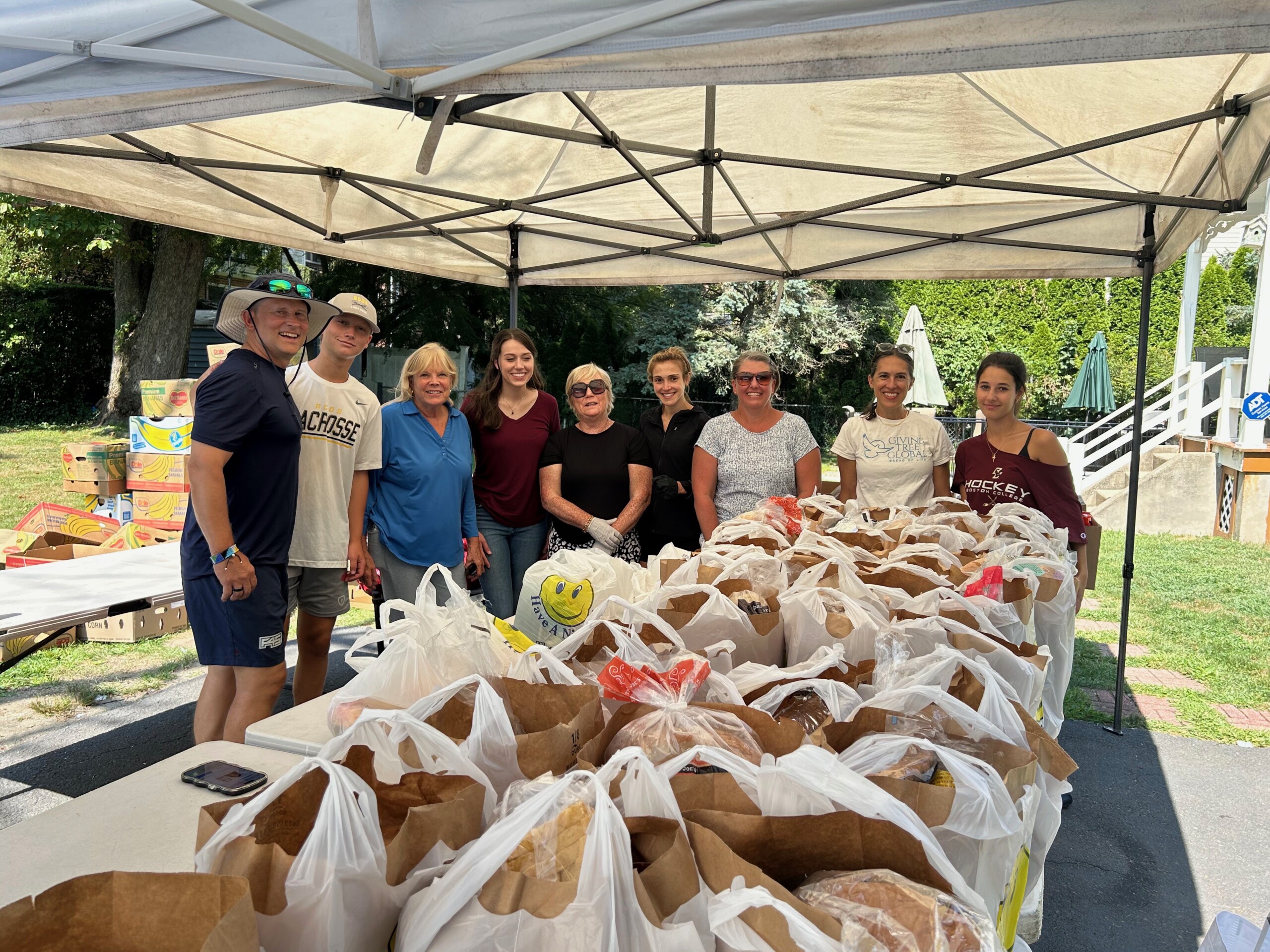 (PHOTO: A dedicated team of volunteers on a Rye pantry day. Contributed.)