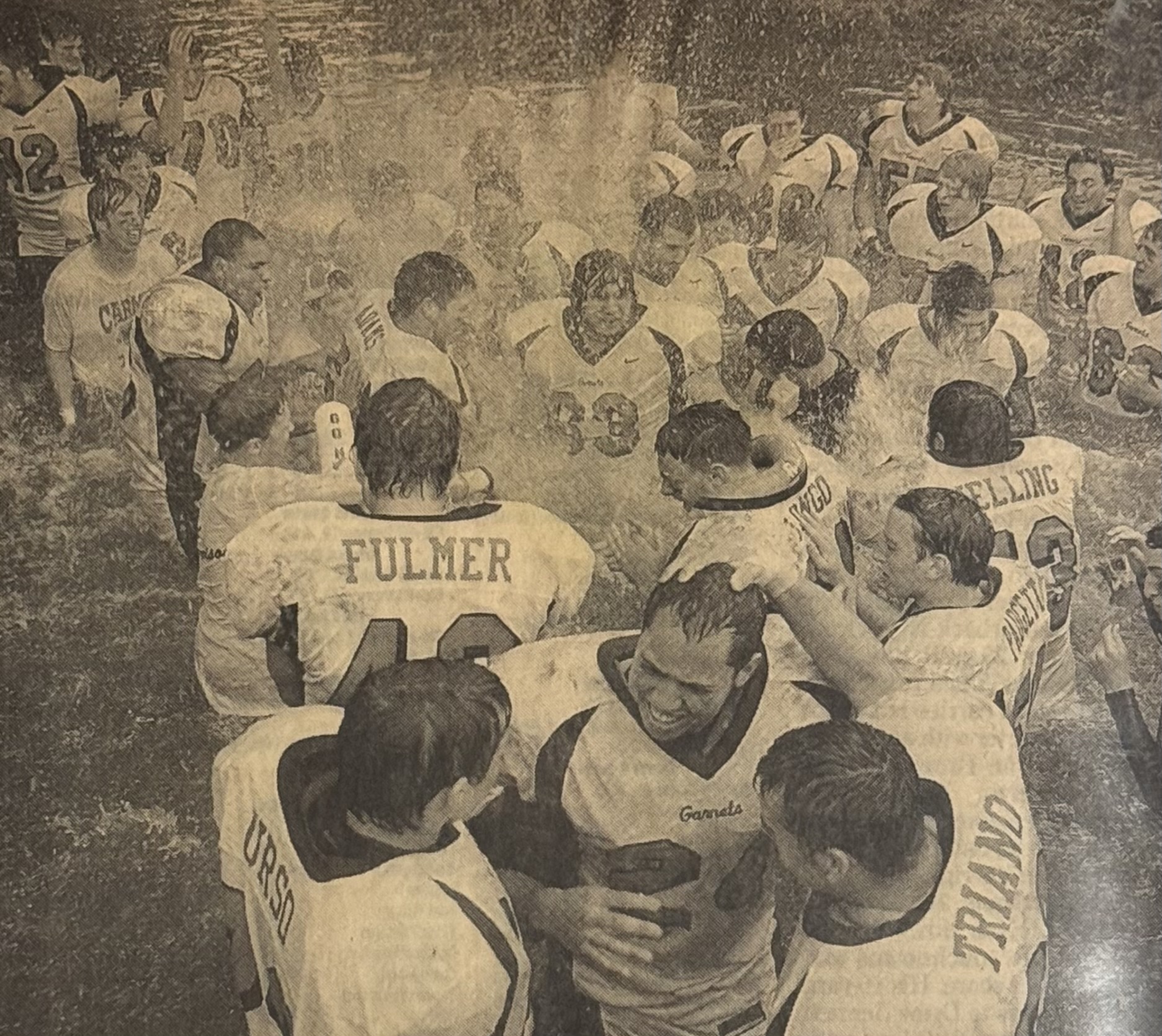 (PHOTO: The 2005 Rye Football team celebrates their 14-0 win over Harrison by jumping into the Rye Brook. In 2004 'Tje Game' was cancelled, making the 2005 victory over the #1 team in Class A that special for all the Garnets. Contributed.)