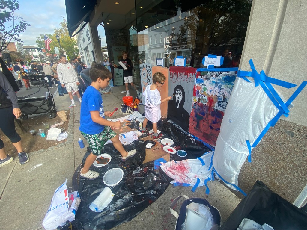 (PHOTO: The 72nd Annual Halloween Window Painting (and second annual parade) on Purchase Street in Downtown Rye, NY on October 19, 2025.)