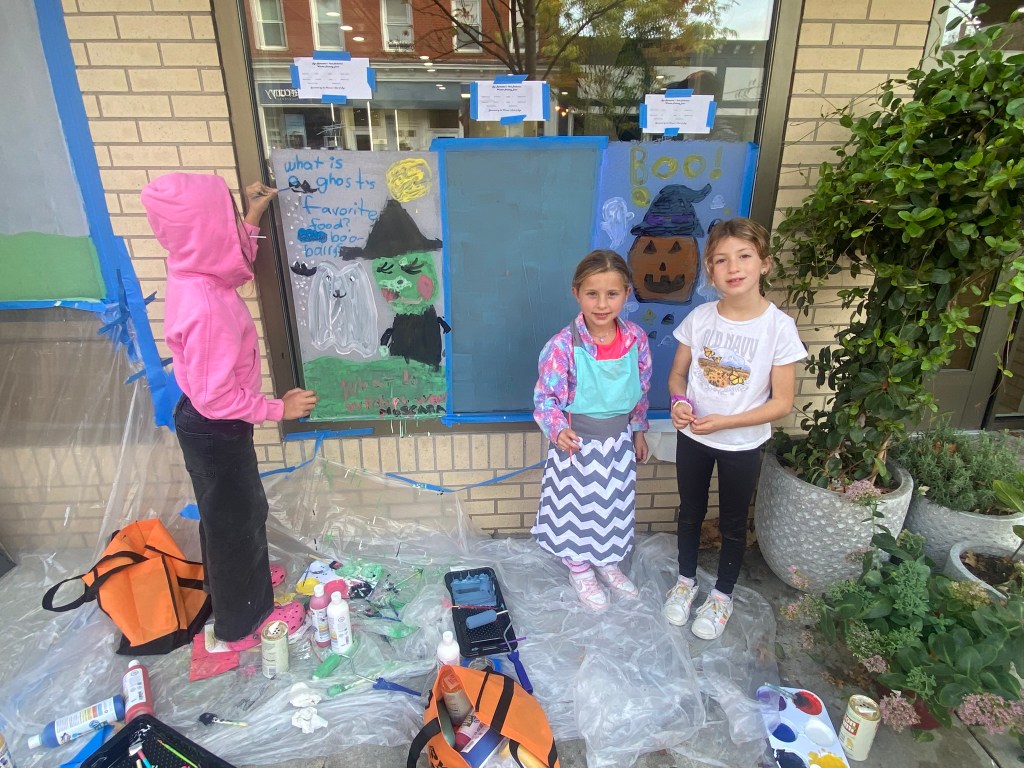 (PHOTO: The 72nd Annual Halloween Window Painting (and second annual parade) on Purchase Street in Downtown Rye, NY on October 19, 2025.)