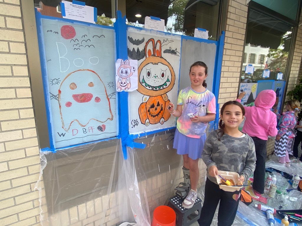 (PHOTO: The 72nd Annual Halloween Window Painting (and second annual parade) on Purchase Street in Downtown Rye, NY on October 19, 2025.)