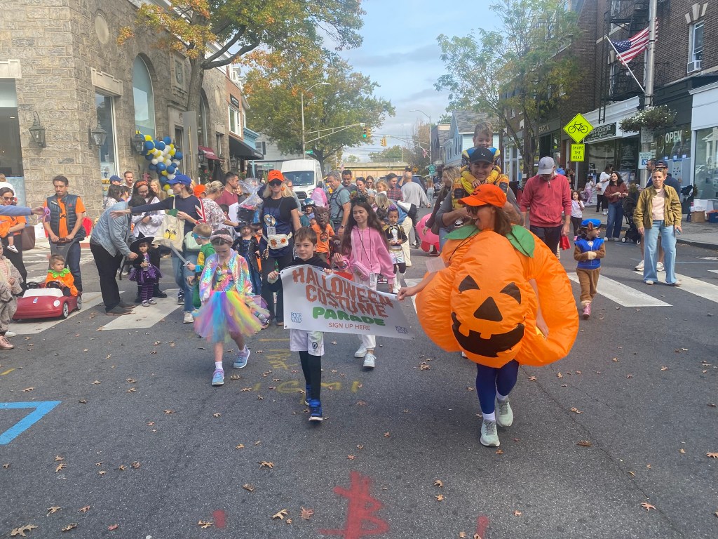 (PHOTO: The 72nd Annual Halloween Window Painting (and second annual parade) on Purchase Street in Downtown Rye, NY on October 19, 2025.)