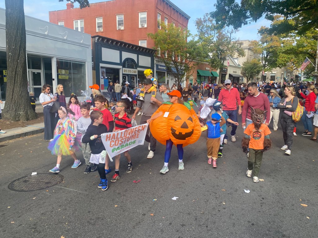 (PHOTO: The 72nd Annual Halloween Window Painting (and second annual parade) on Purchase Street in Downtown Rye, NY on October 19, 2025.)