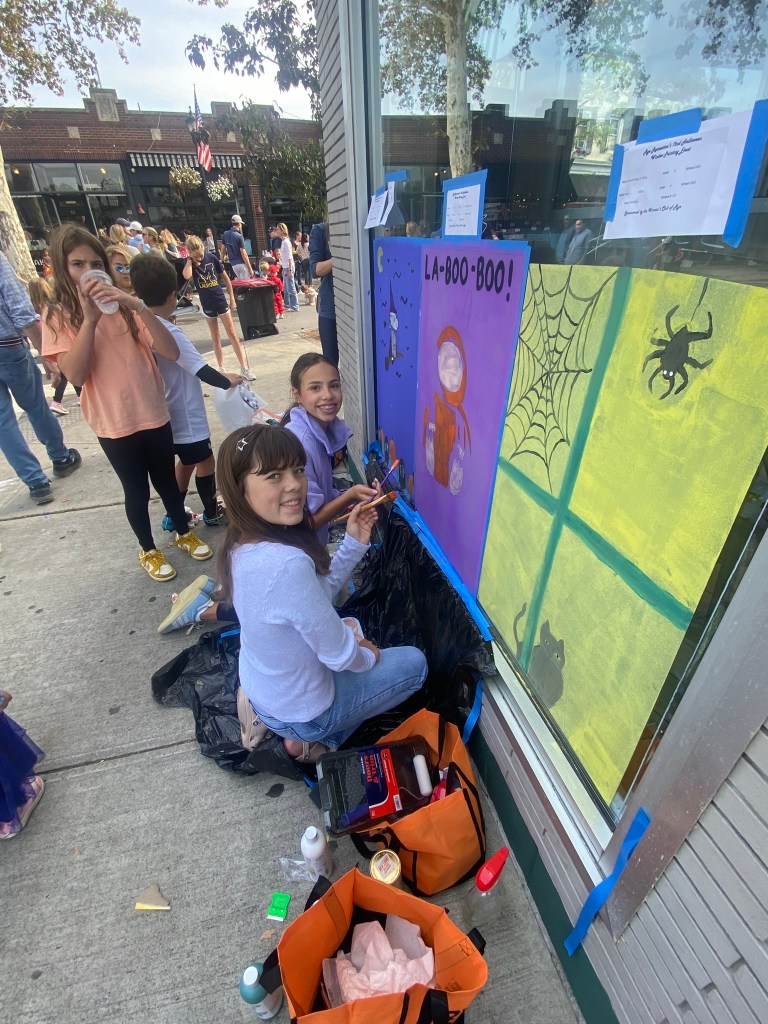 (PHOTO: The 72nd Annual Halloween Window Painting (and second annual parade) on Purchase Street in Downtown Rye, NY on October 19, 2025.)