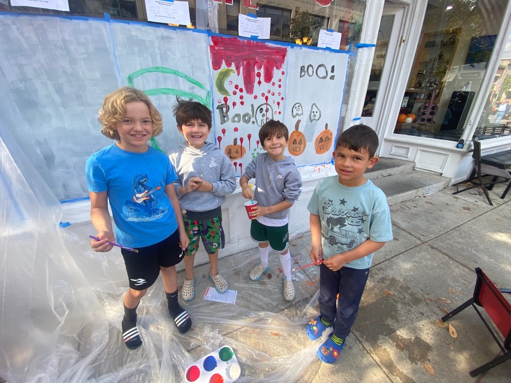 (PHOTO: The 72nd Annual Halloween Window Painting (and second annual parade) on Purchase Street in Downtown Rye, NY on October 19, 2025.)