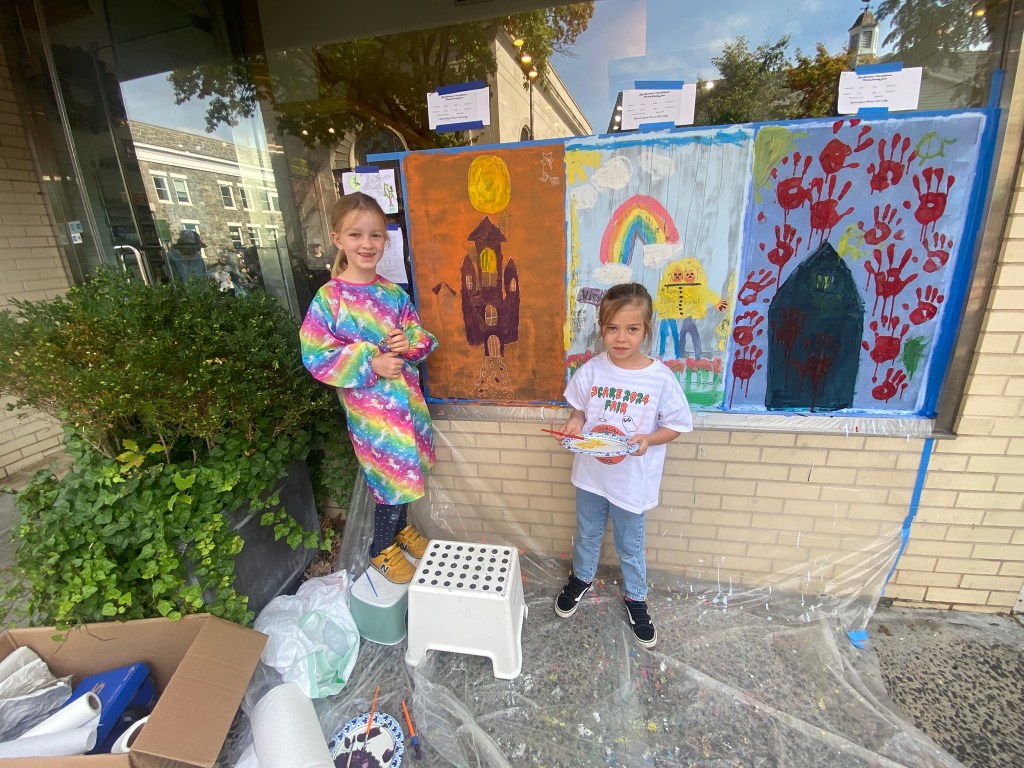 (PHOTO: The 72nd Annual Halloween Window Painting (and second annual parade) on Purchase Street in Downtown Rye, NY on October 19, 2025.)