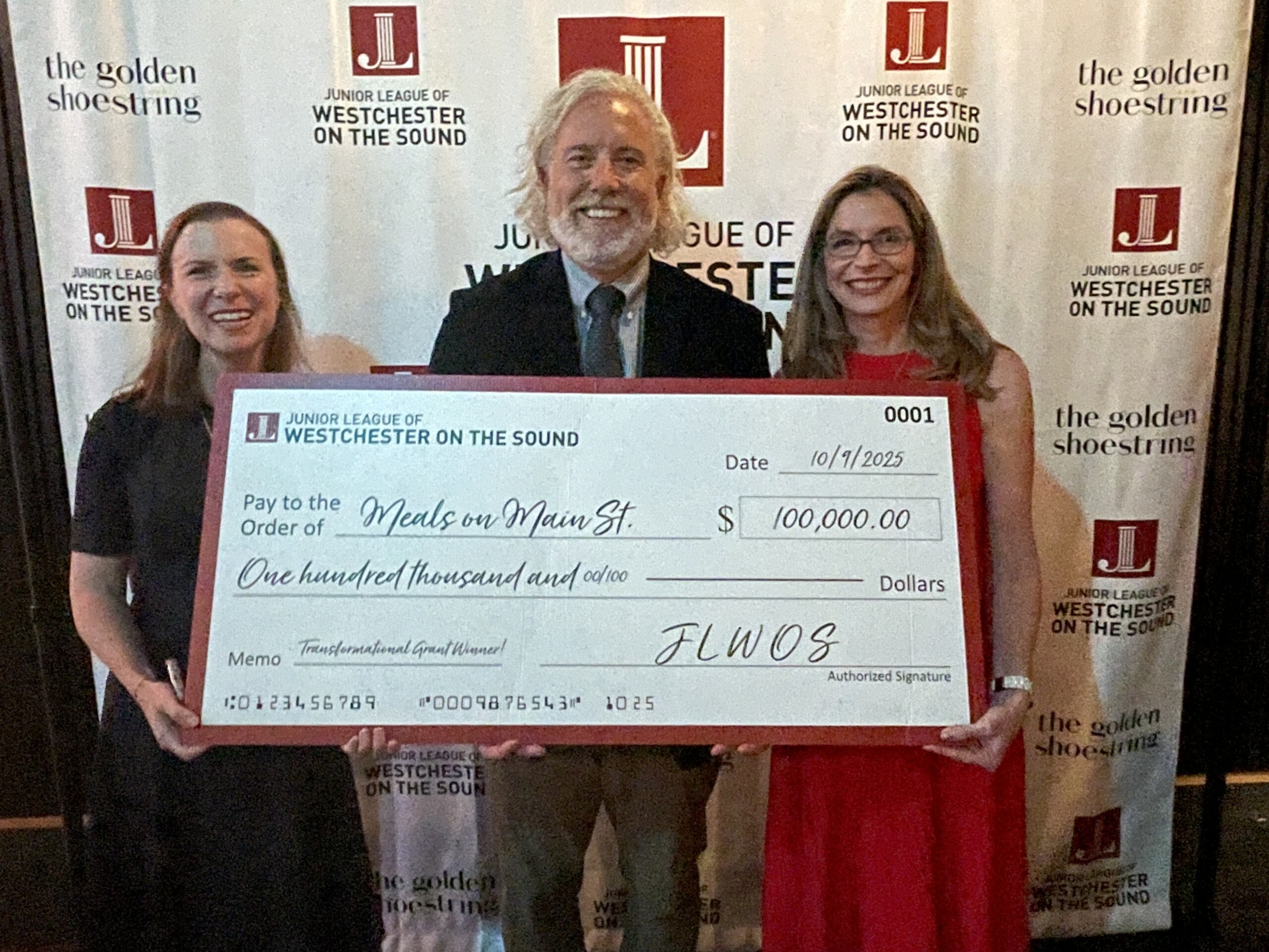 (PHOTO: Caroline Vance (Junior League of Westchester on the Sound (JLWOS) grants chair; Jon Haseltine, executive director of Meals on Main Street Port Chester (accepting the $100K Transformational Grant for a first of its kind mobile community cafe); and Chris Howe, JLWOS president. Contributed.)
