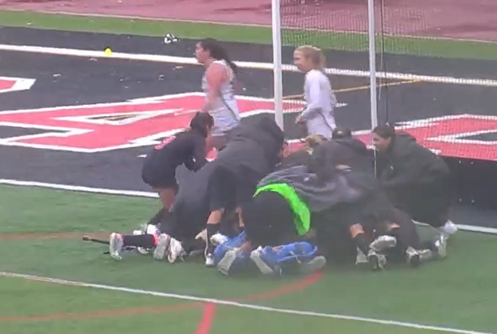 (PHOTO: The Rye Field Hockey team celebrates their 1-0 double overtime victory over JJCR in the sectional semifinals on October 30, 2025.)