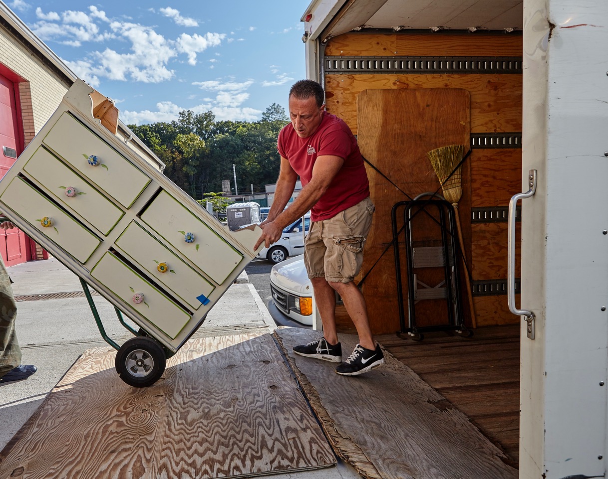 (PHOTO: Furniture Sharehouse's moving contractor Dave Vitullo, who handles delivery and pick up of furnishings. Contributed.)
