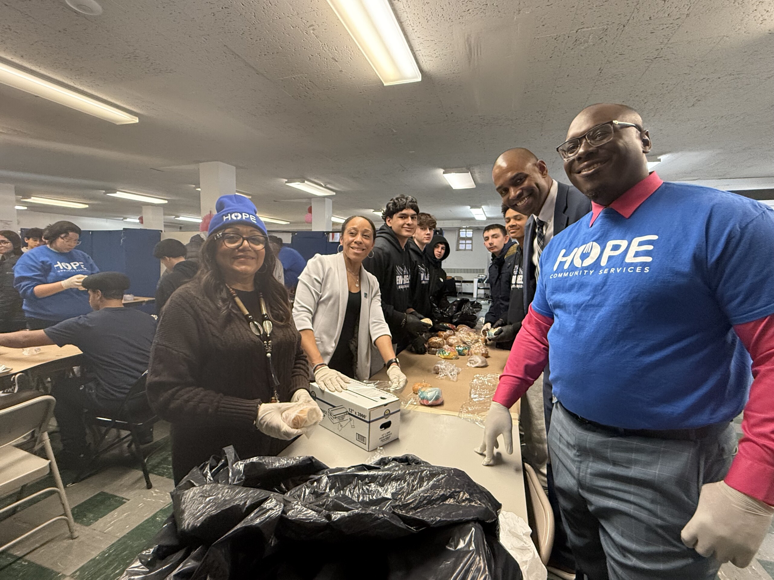 (PHOTO: Westchester County Legislator Terry Clements, New Rochelle Mayor Yadira Ramos-Herbert, NYS Lt. Governor Antonio Delgado, New Rochelle City Councilman Shane Osinloye at HOPE with students volunteering. Contributed.)
