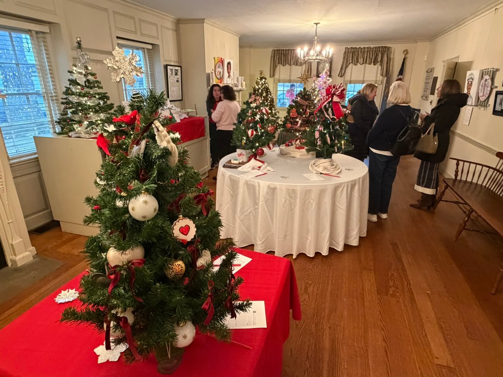 (PHOTO: The Season of Giving celebration at the Square House on November 30, 2025, organized by the Rye Historical Society. These mini trees were up for auction to raise money for the historical society.)