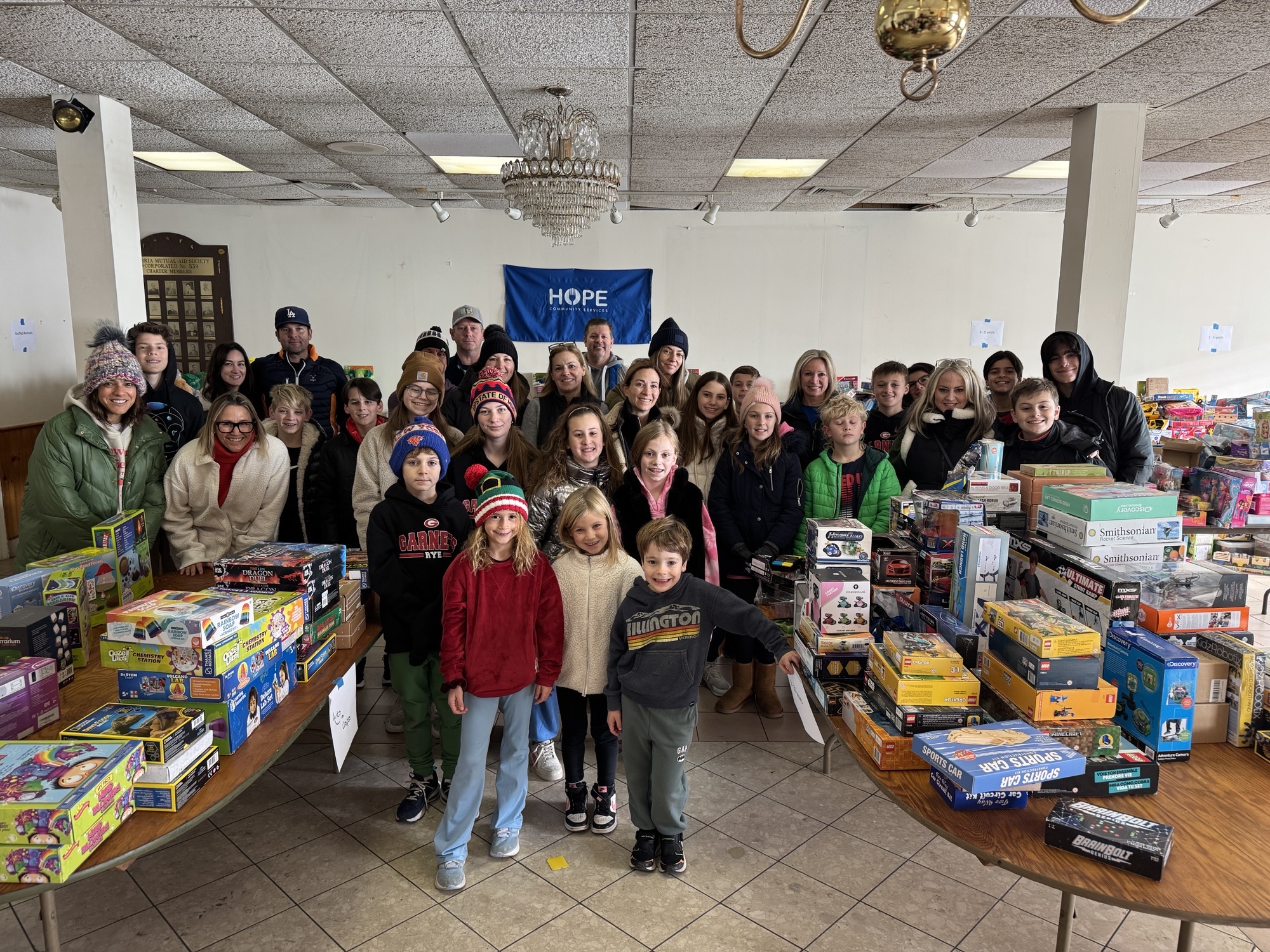 (PHOTO: Rye Elves helping with toy sorting and packing. Contributed.)