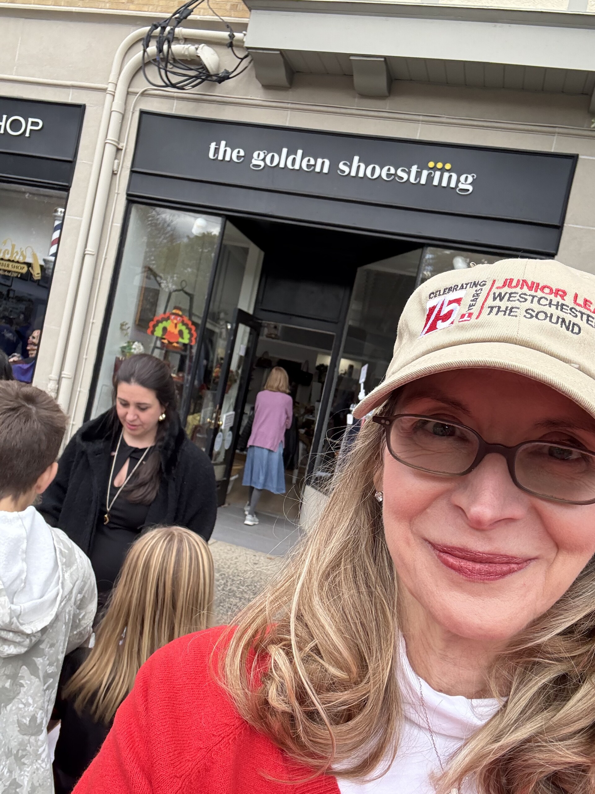 (PHOTO: Chris Howe, president of the Junior League of Westchester on the Sound, at the Golden Shoestring thrift shop. Contributed.)