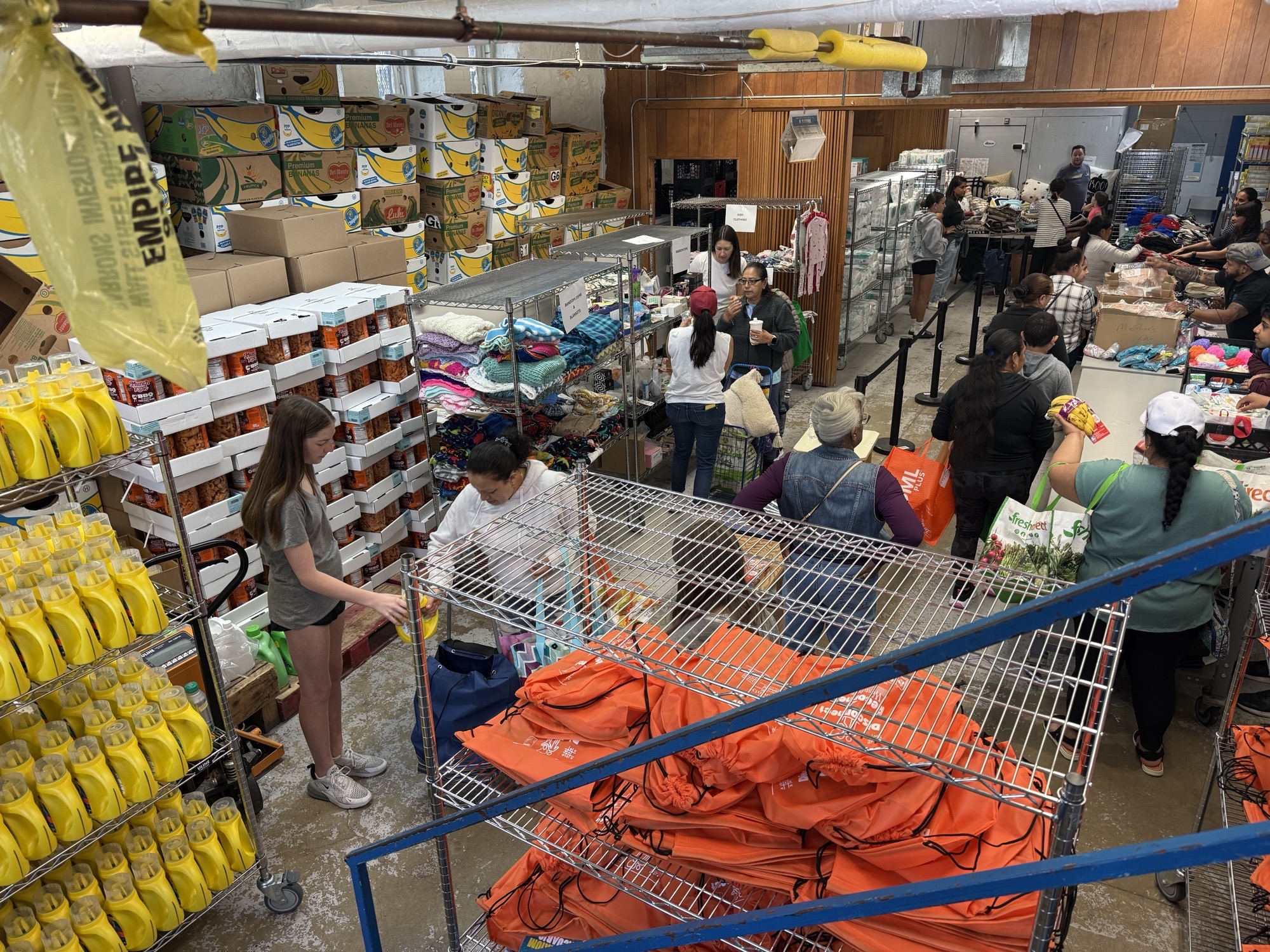 (PHOTO: Rye families helping with Mother’s Day Giveaway. Contributed.)
