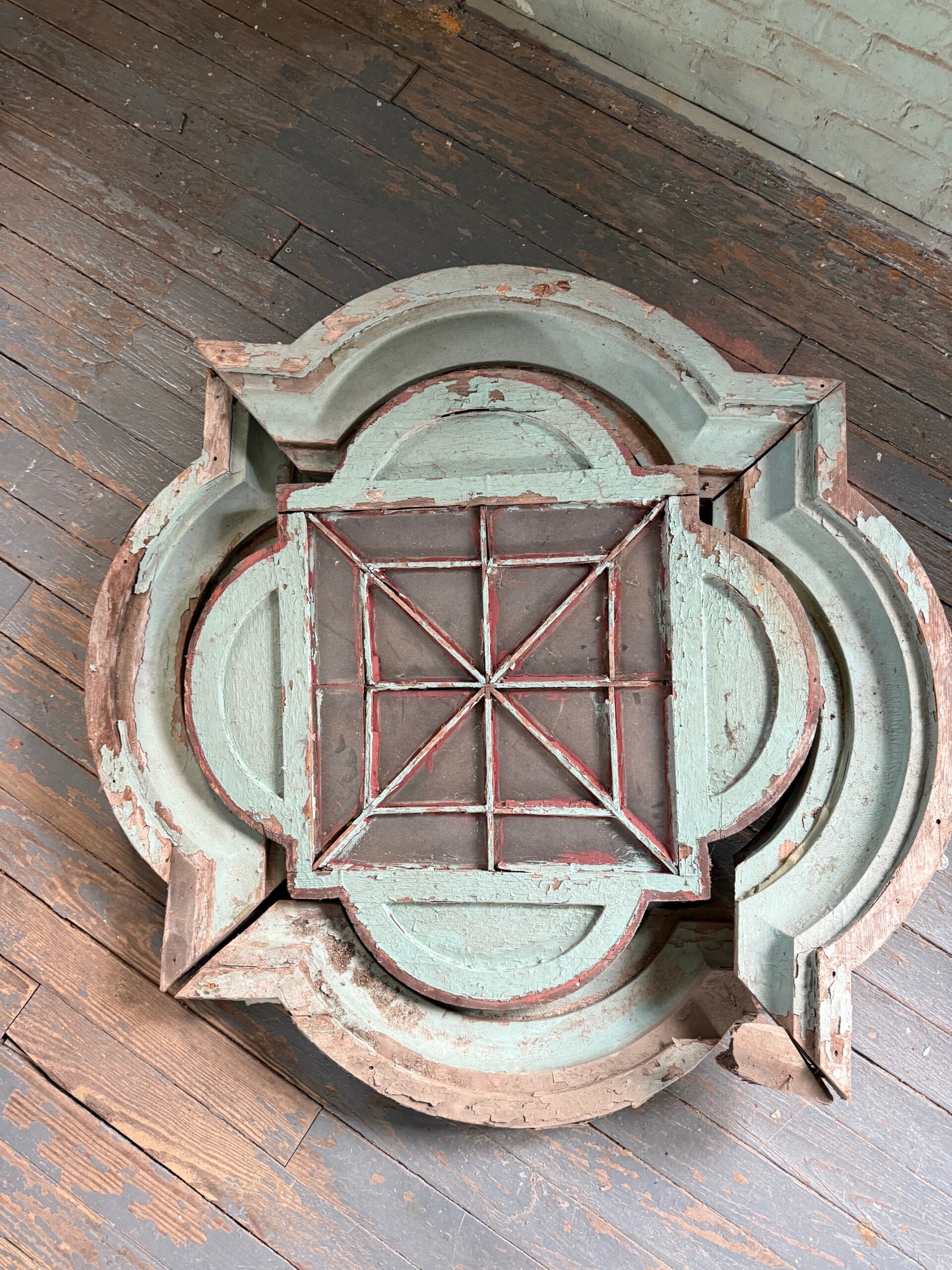 (PHOTO: One original quatrefoil “rosette” window which was found buried in the tower building basement. This will serve as a template for eight brand new windows to replace the broken and missing windows currently in place. Contributed.)