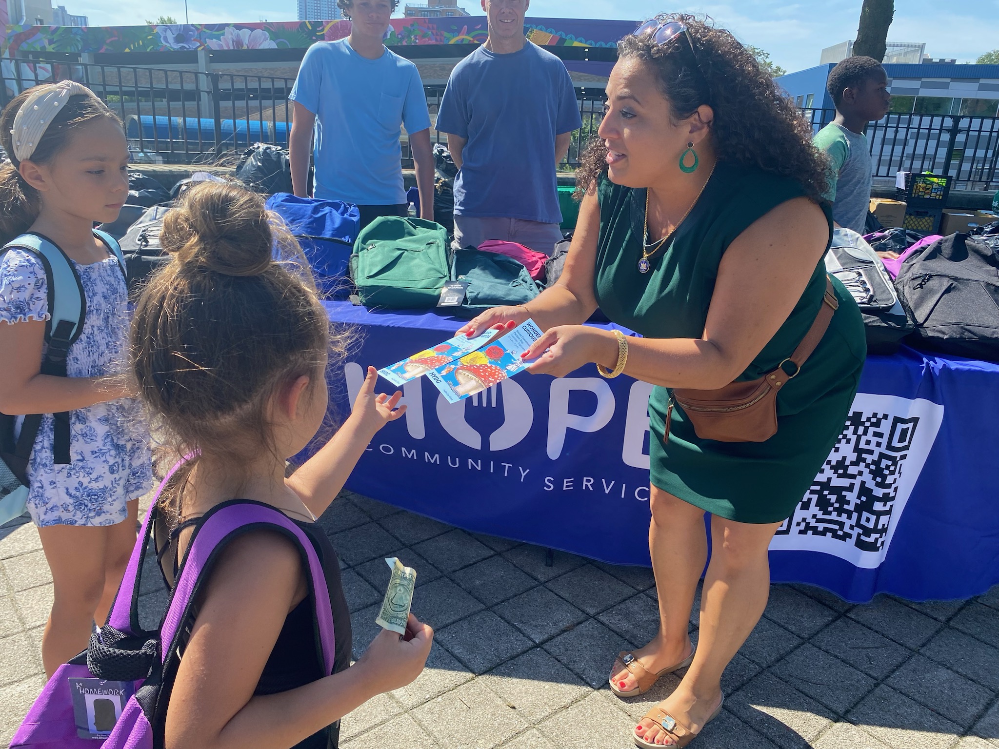 (PHOTO: New York State Senator Nathalia Fernandez with HOPE helping distribute school supplies to children in Westchester County. Contributed.)