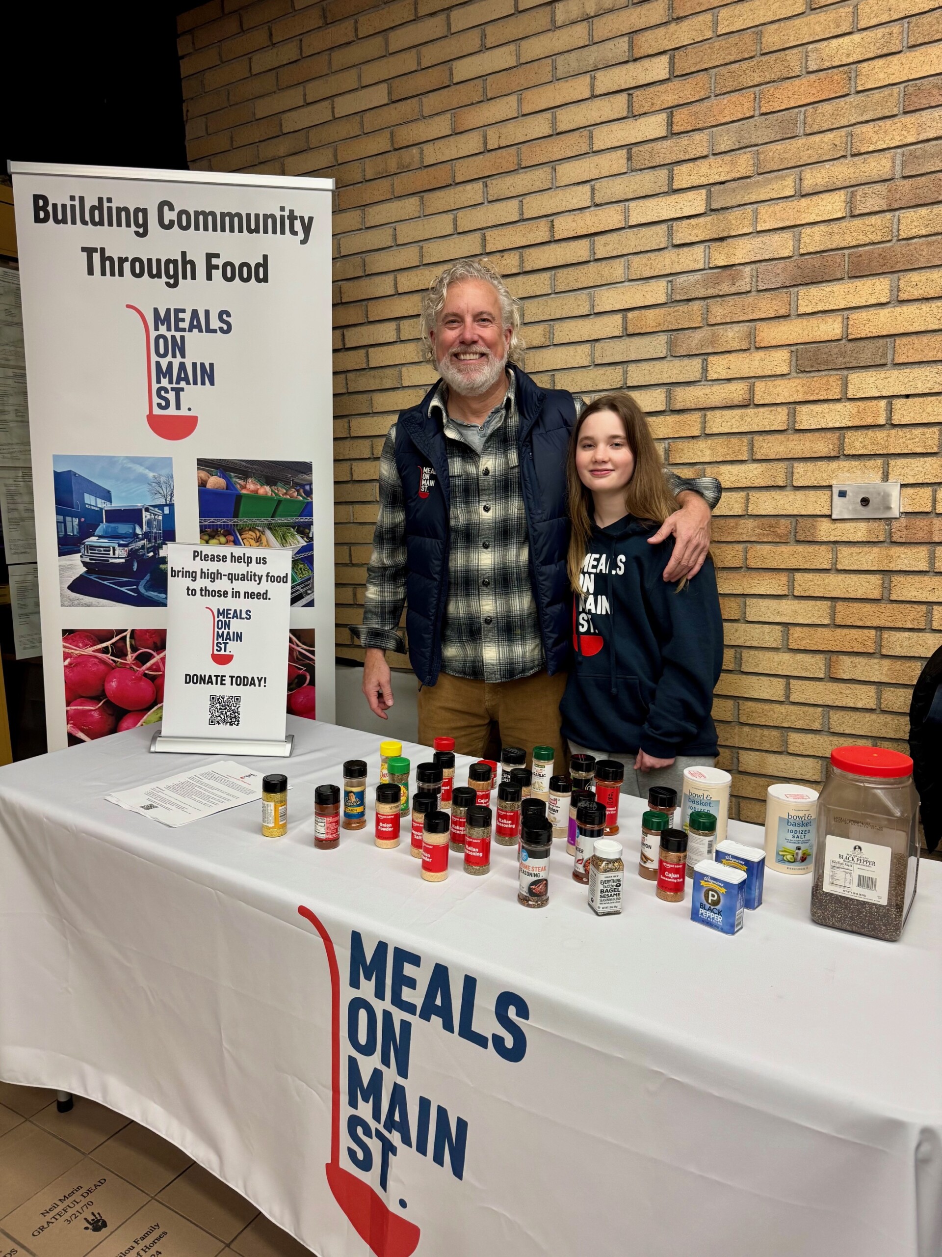 (PHOTO: Executive Director Jon Haseltine at the Meals on Main Street Spice Drive at the Capitol Theatre. Contributed.)