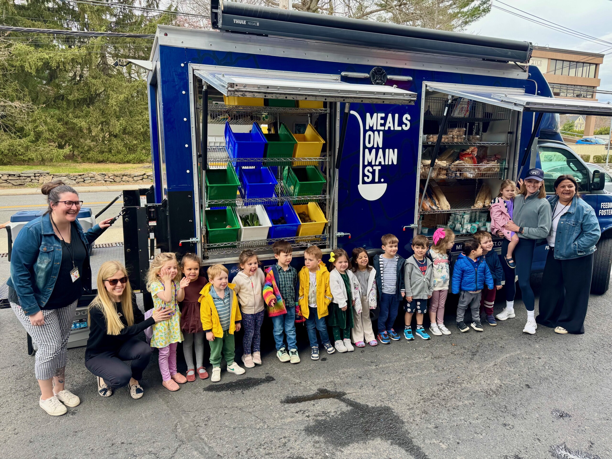 (PHOTO: Students at Rye Presbyterian School volunteering with Meals on Main Street. Contributed.)