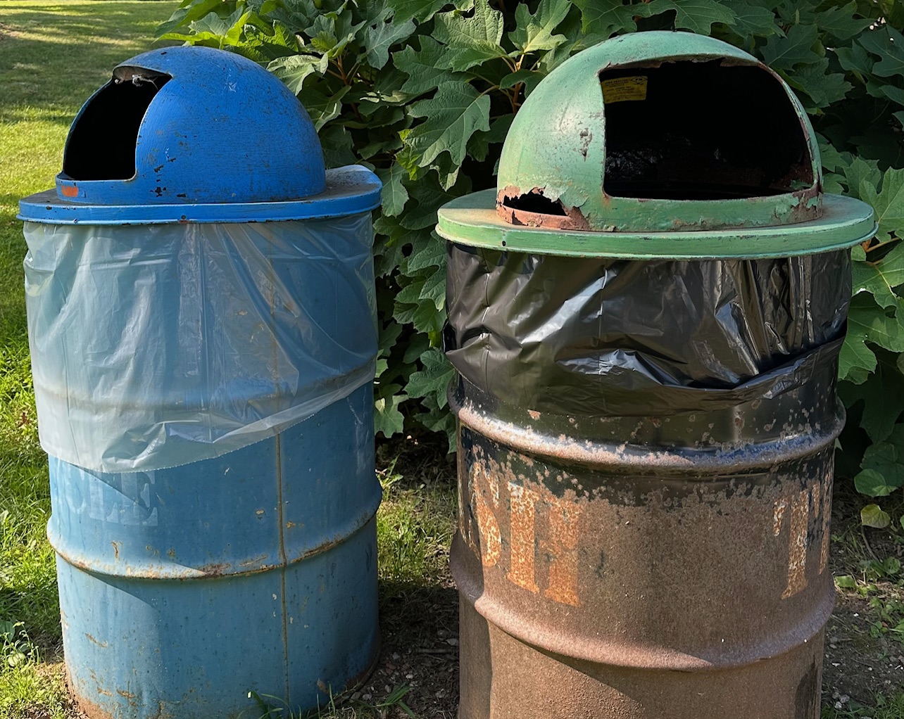 (PHOTO: The old, rusted trash cans currently in Rye Town Park which will be replaced in 2026. Contributed.)