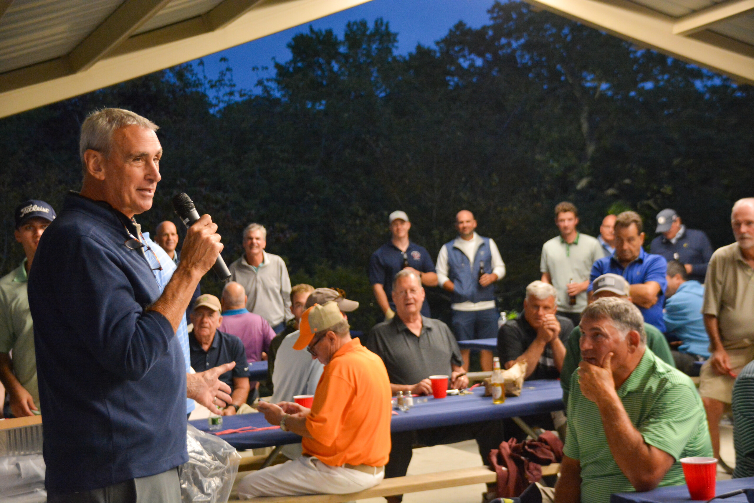 (PHOTO: George Kirby talks to the crowd at the 35th Annual George J. Kirby Memorial Golf Outing, held Monday, September 22, 2025. The charity outing raised $15,500 for Rye senior programs and for the Rye Rec camp scholarship fund. Contributed.)