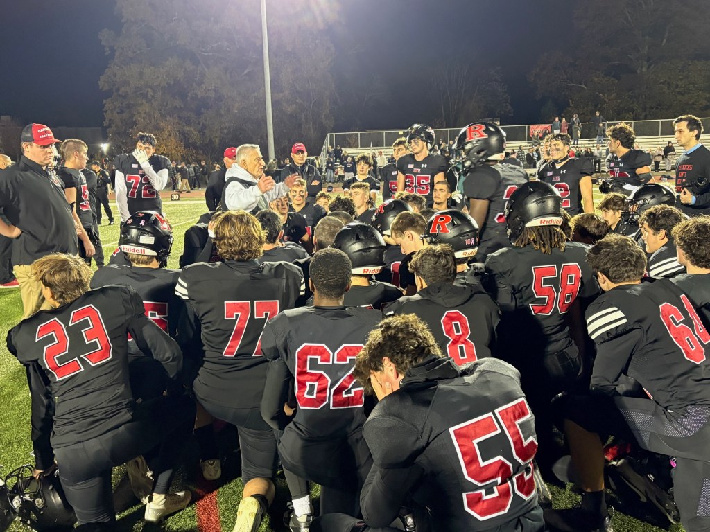 (PHOTO: The Rye Football team in their postgame huddle from November 7, 2025. Contributed.)