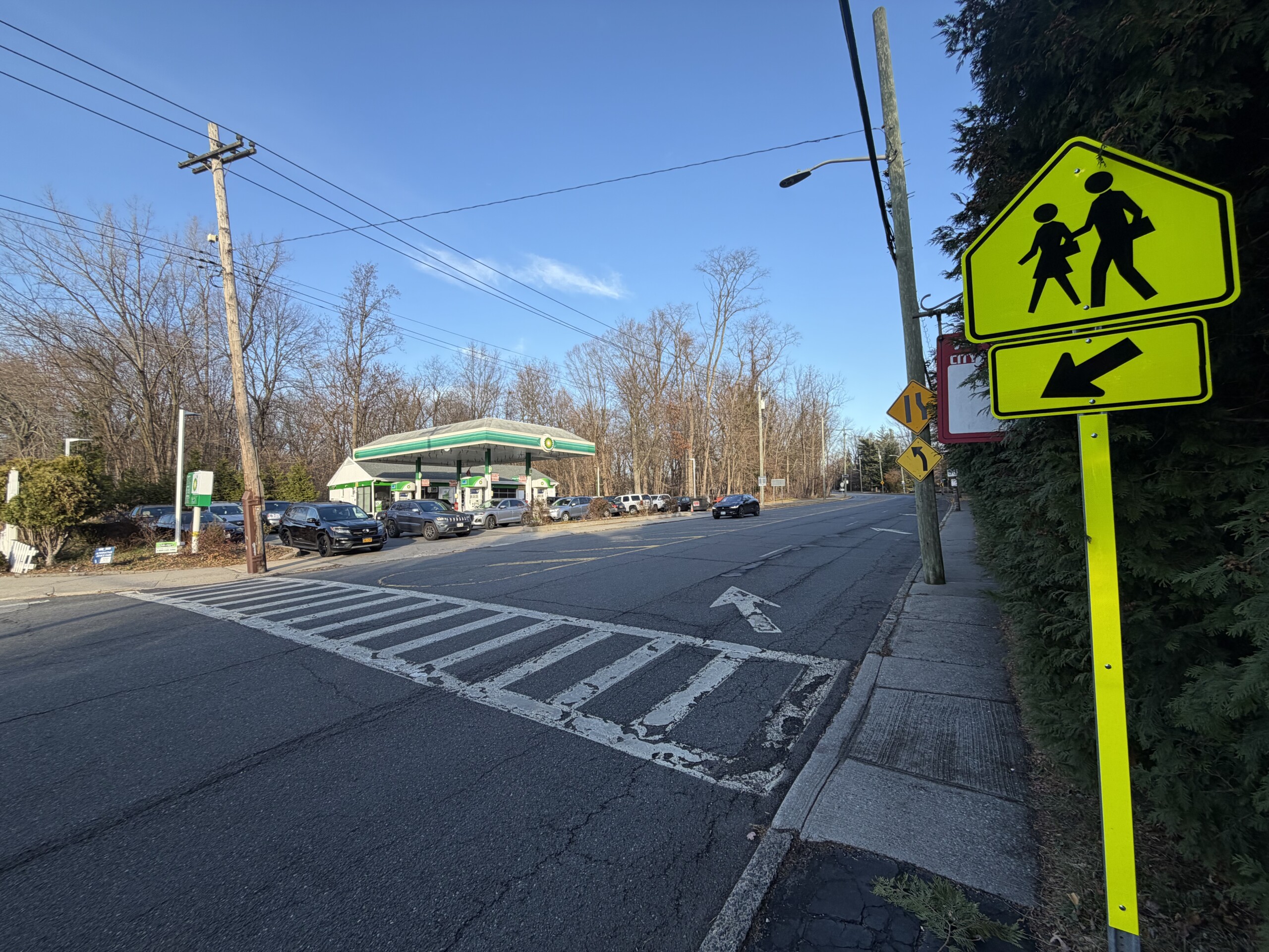 (PHOTO: The current cross walk at the intersection of Boston Post Road and Hornidge Road used by students at Rye Neck High School and Middle School.)