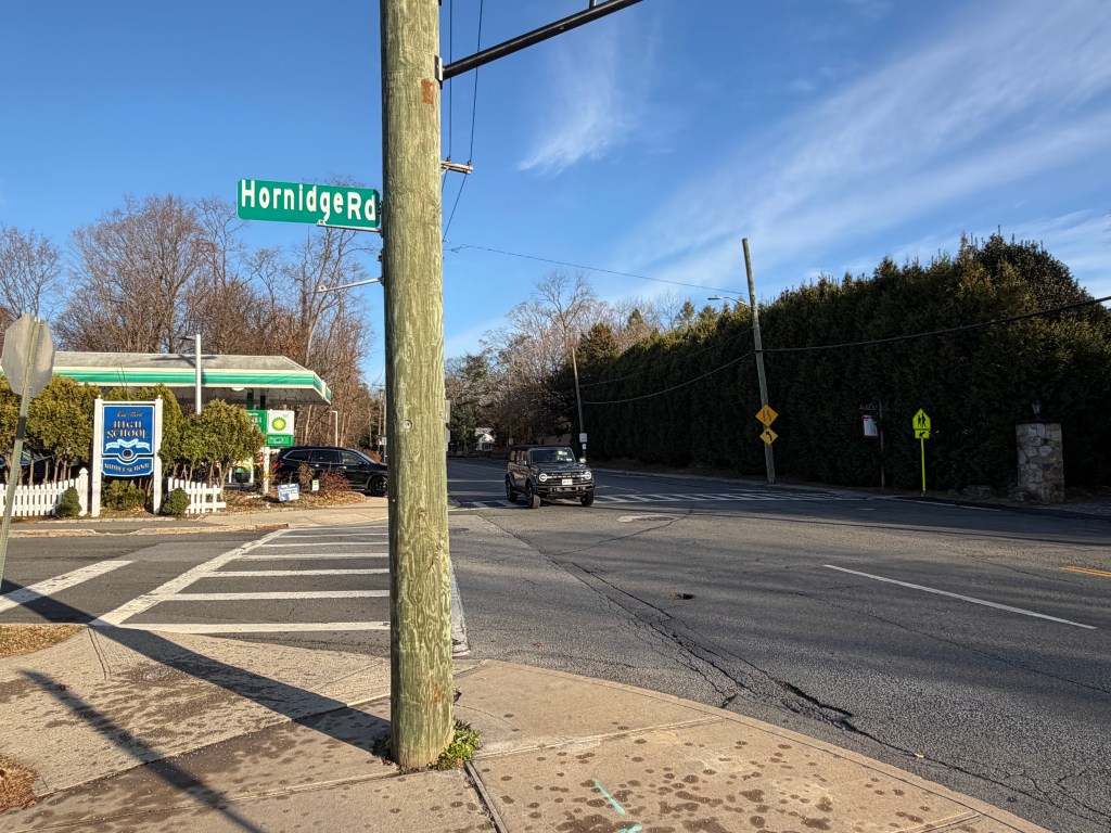 (PHOTO: The current cross walk at the intersection of Boston Post Road and Hornidge Road used by students at Rye Neck High School and Middle School.)
