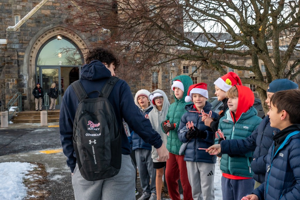(PHOTO: The annual Candy Cane Express at Rye High School on Thursday on December 18th, 2025 had elementary school students from Midland, Milton, and Osborn handing out candy canes to high schoolers as they entered the building. Contributed.)