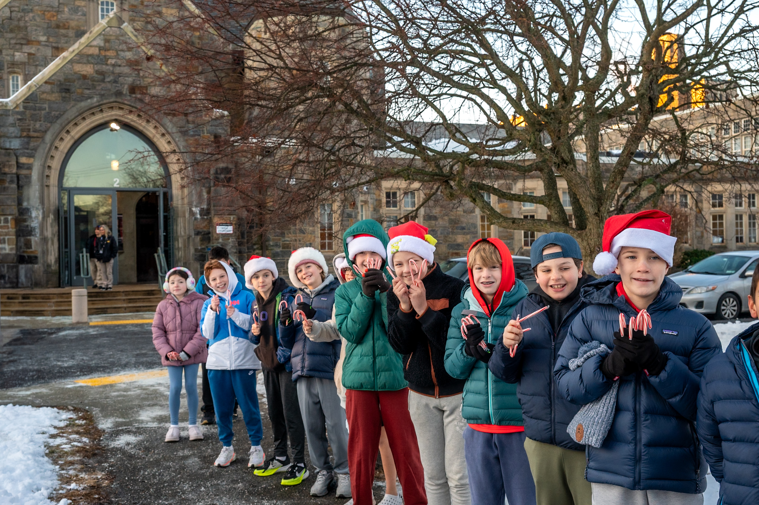 (PHOTO: The annual Candy Cane Express at Rye High School on Thursday on December 18th, 2025 had elementary school students from Midland, Milton, and Osborn handing out candy canes to high schoolers as they entered the building. Contributed.)