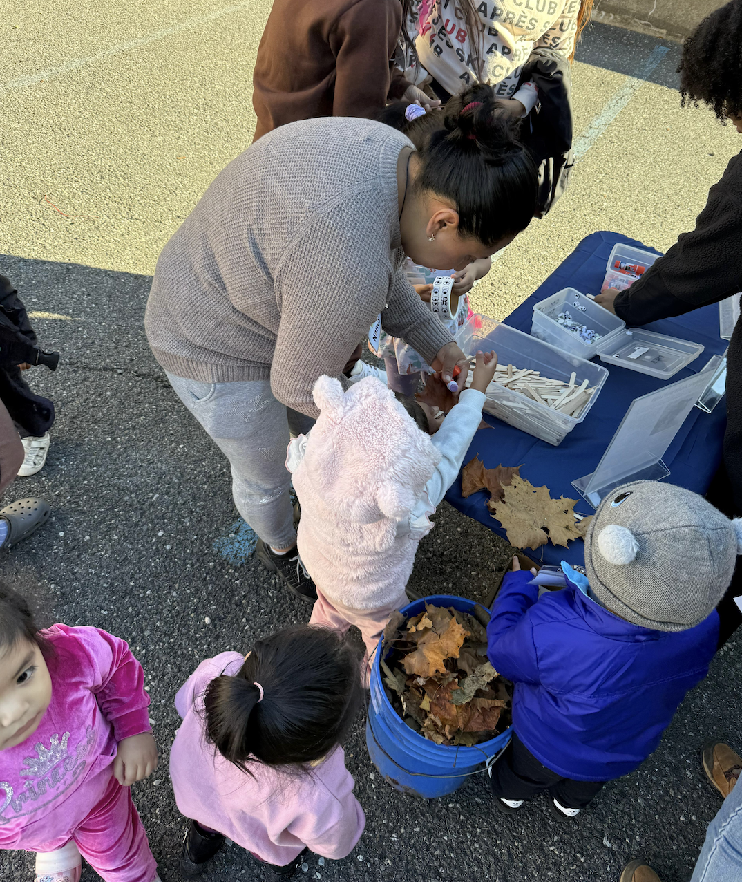 (PHOTO: Program families enjoying Rye Nature Center’s NatureStation at at All Souls Community Center in Port Chester. Contributed.)